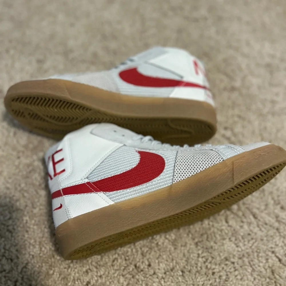 Nike High-Top Sneakers with Red Swoosh